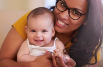 Diverse mother with infant