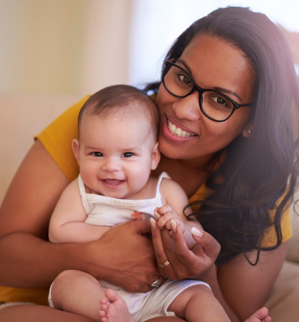 Diverse mother with infant